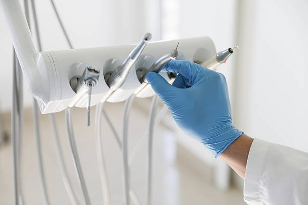 Professional Tooth Extraction technician working in New Franklin, OH